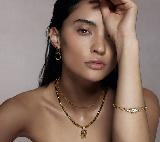 Cassie Tiger's Eye Necklace worn on model collarbone - FREQNC