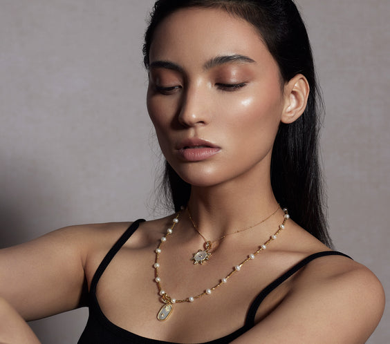 Rhea Gold Dot Necklace styling on model - FREQNC atelier