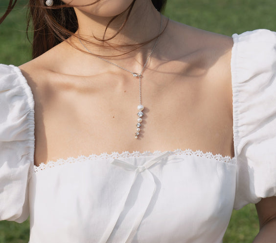 Ouroboros Pearl Drop Necklace serpent loop detail - FREQNC