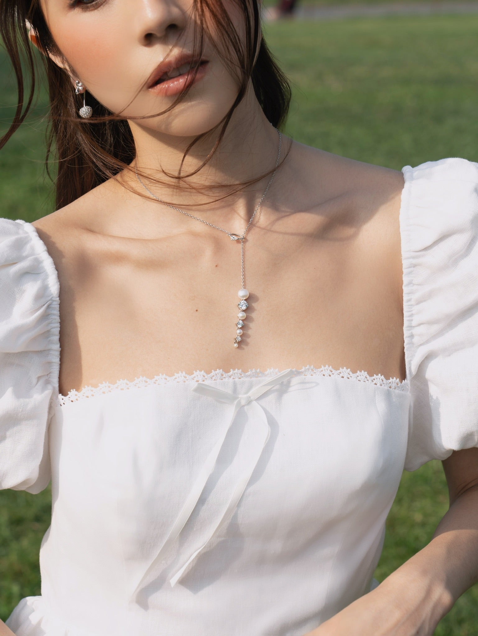 Ouroboros Pearl Drop Necklace serpent loop detail - FREQNC