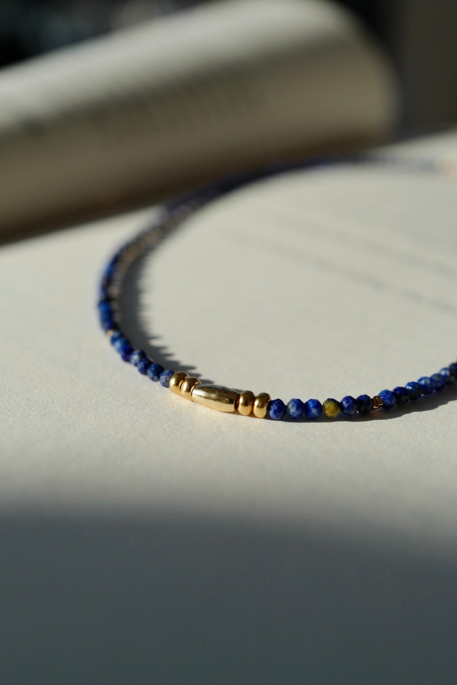 Lapis Lazuli Protection Necklace layered on model - FREQNC atelier
