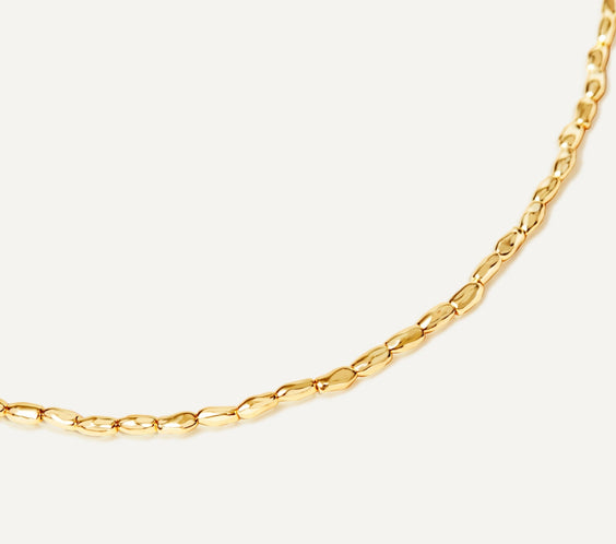 Argento Wishful gold bead necklace close-up detail showing organic bead texture - FREQNC luxury chain