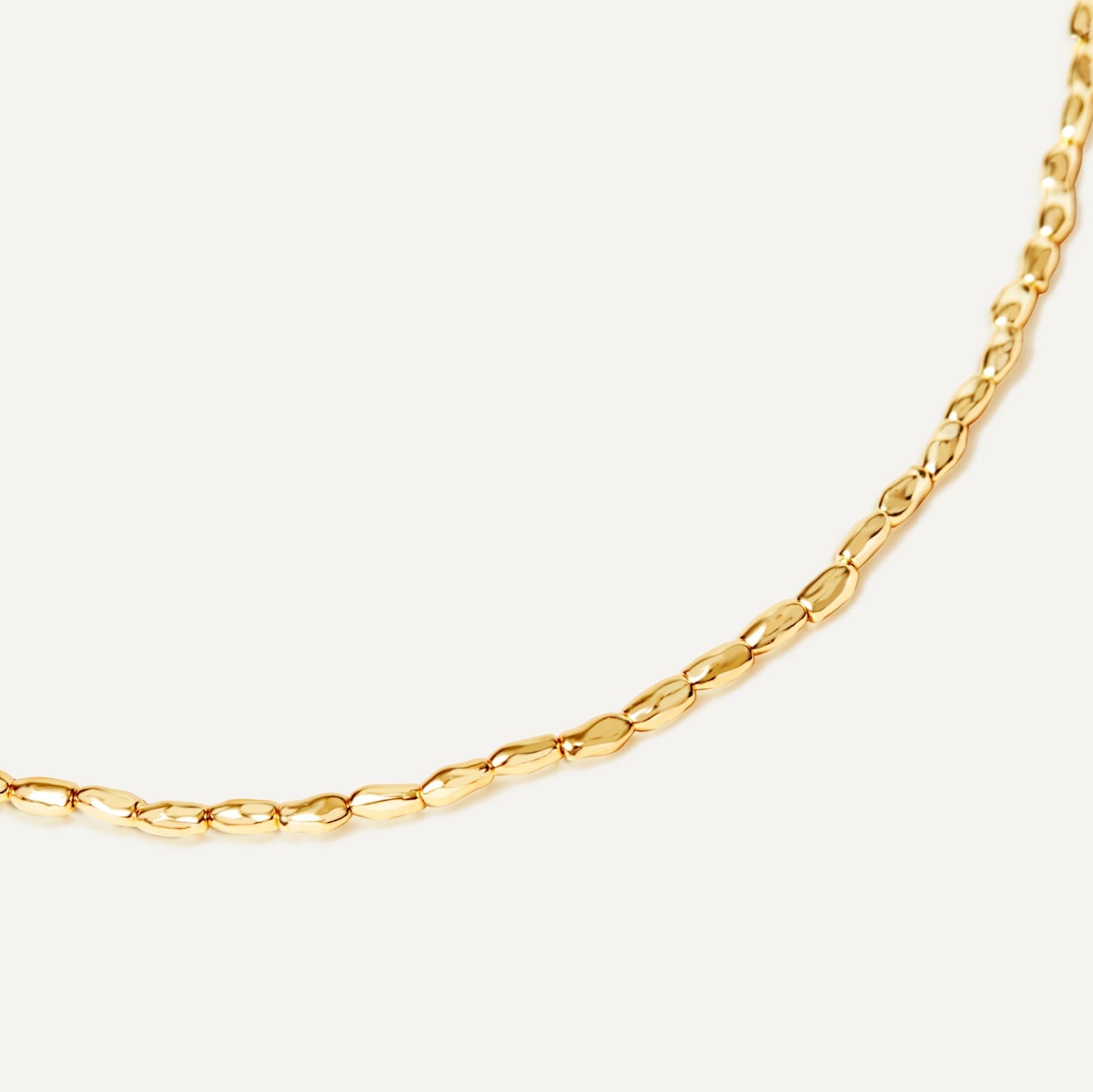 Argento Wishful gold bead necklace close-up detail showing organic bead texture - FREQNC luxury chain