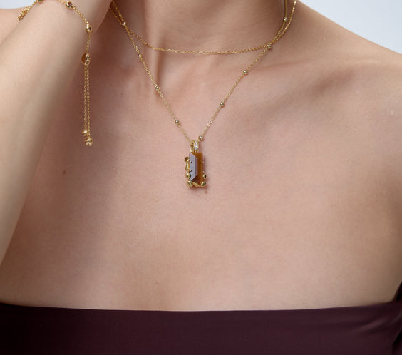 Cuddly Bear Charm pendant with tiger's eye on 18K gold necklace and bracelet - FREQNC spirit animal jewelry