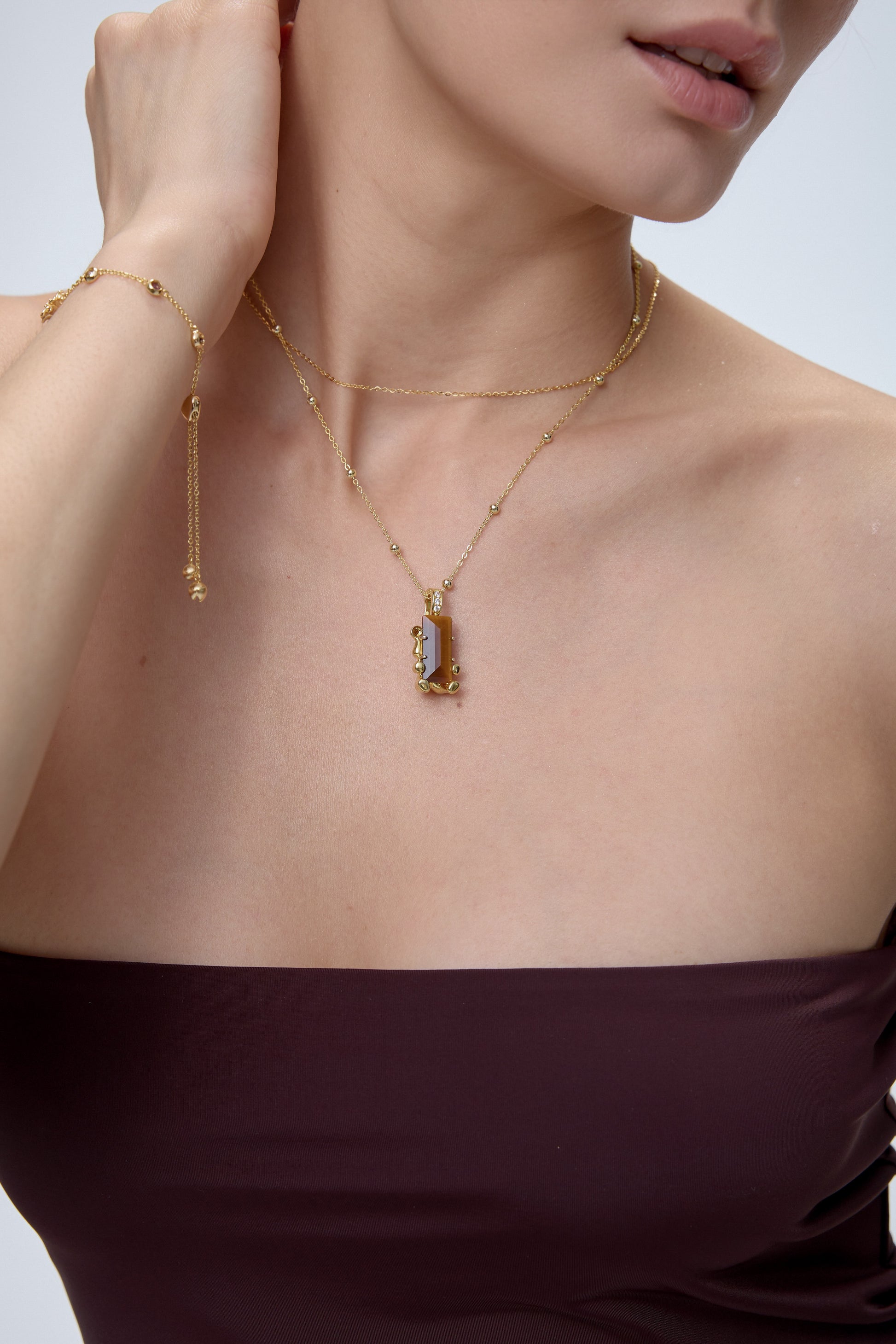 Cuddly Bear Charm pendant with tiger's eye on 18K gold necklace and bracelet - FREQNC spirit animal jewelry