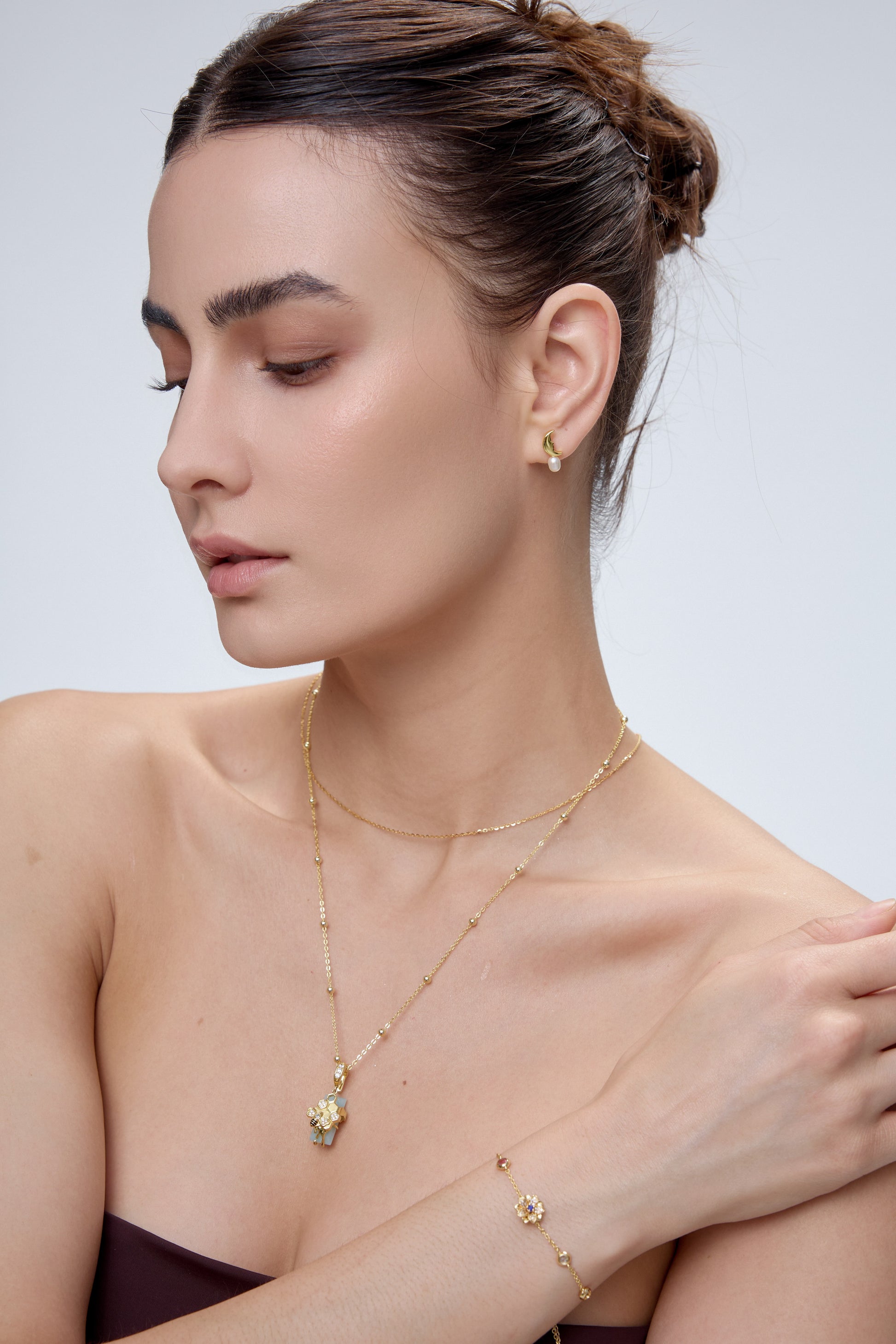 HexaMyst Bee Charm pendant styling with gold layered necklace - FREQNC