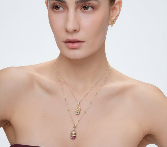 Spirit Animal Talisman crystal charm worn on model - FREQNC spirit animal jewelry