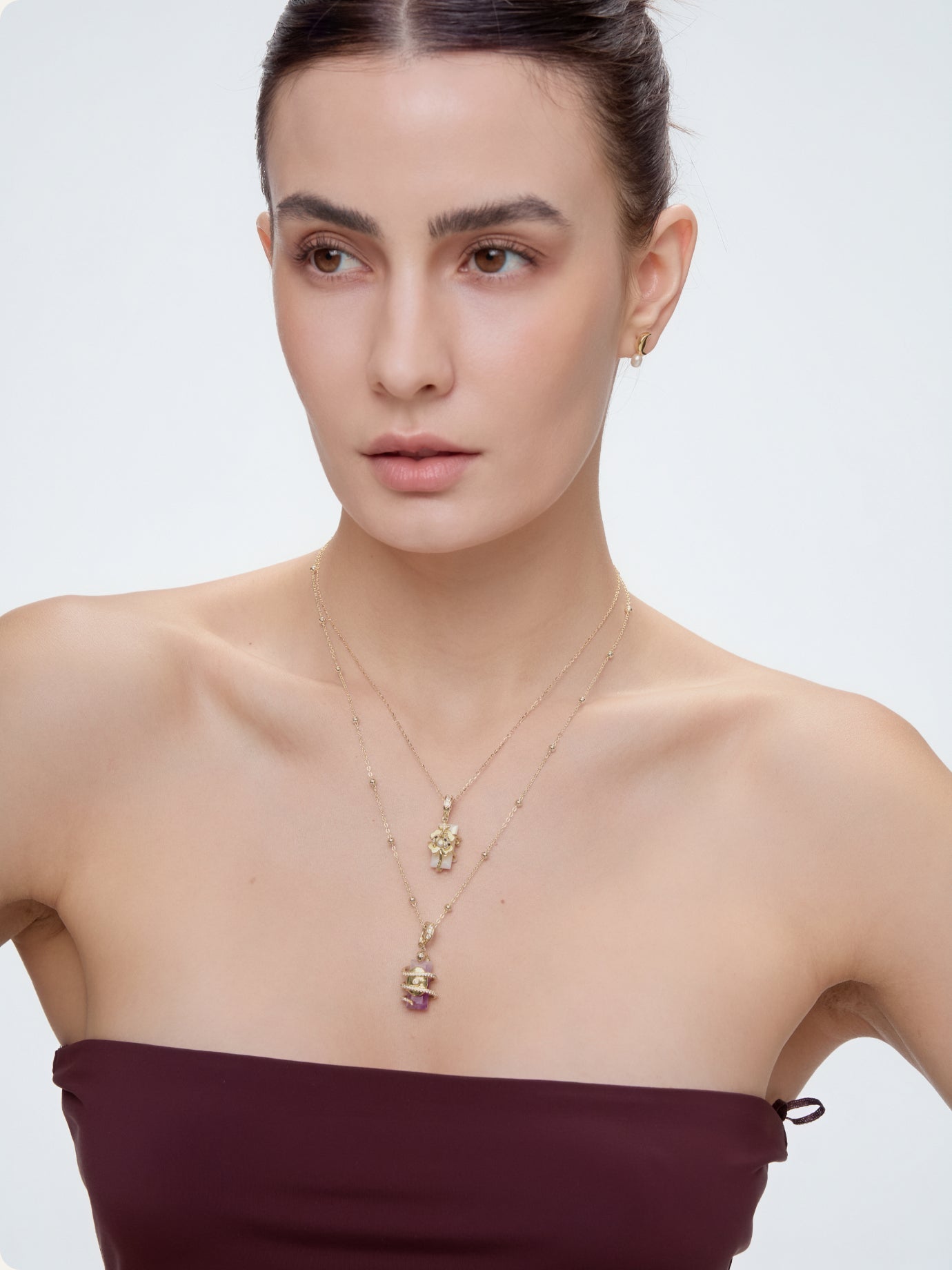 Spirit Animal Talisman crystal charm worn on model - FREQNC spirit animal jewelry