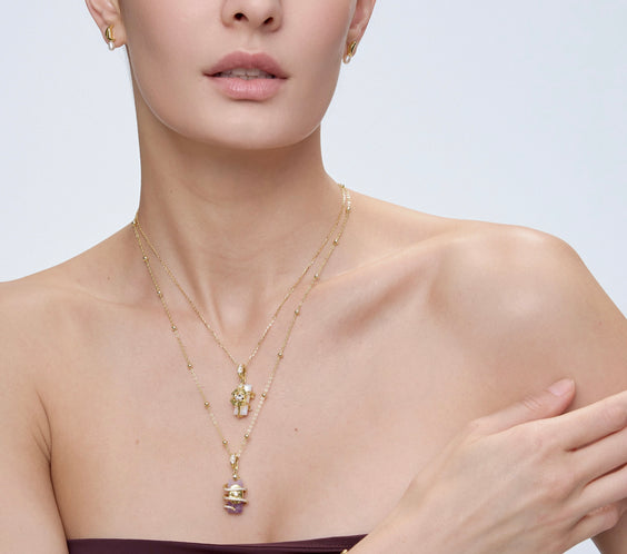 Ladybug Clover Charm styling with gold layered necklace - FREQNC