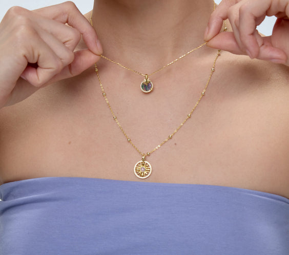 Rhea Flow Necklace layered with pendant on model - FREQNC atelier
