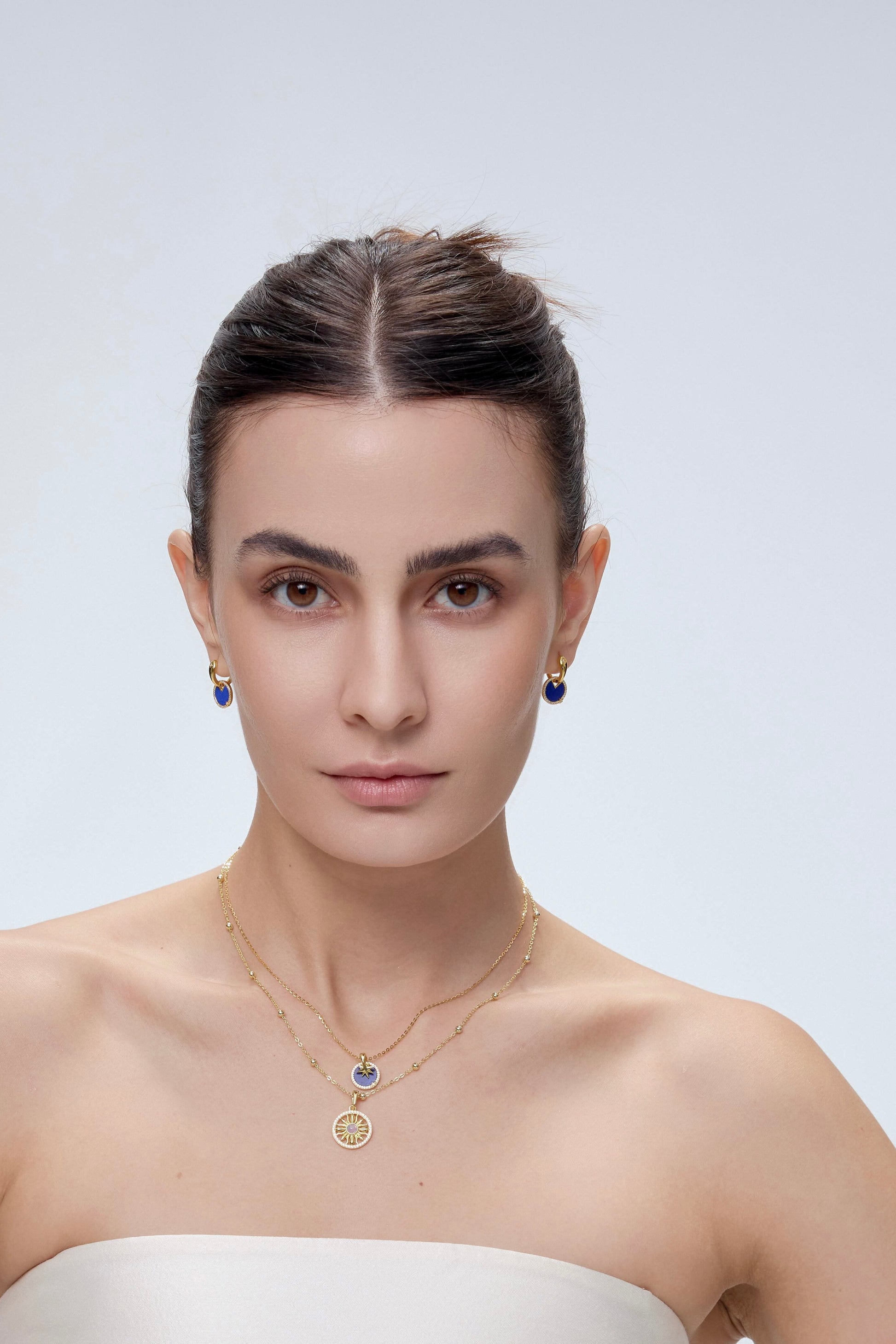 Star Earrings crystal disc detail on model - FREQNC
