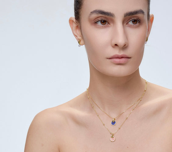 Star Charm styling with crystal disc close-up - FREQNC
