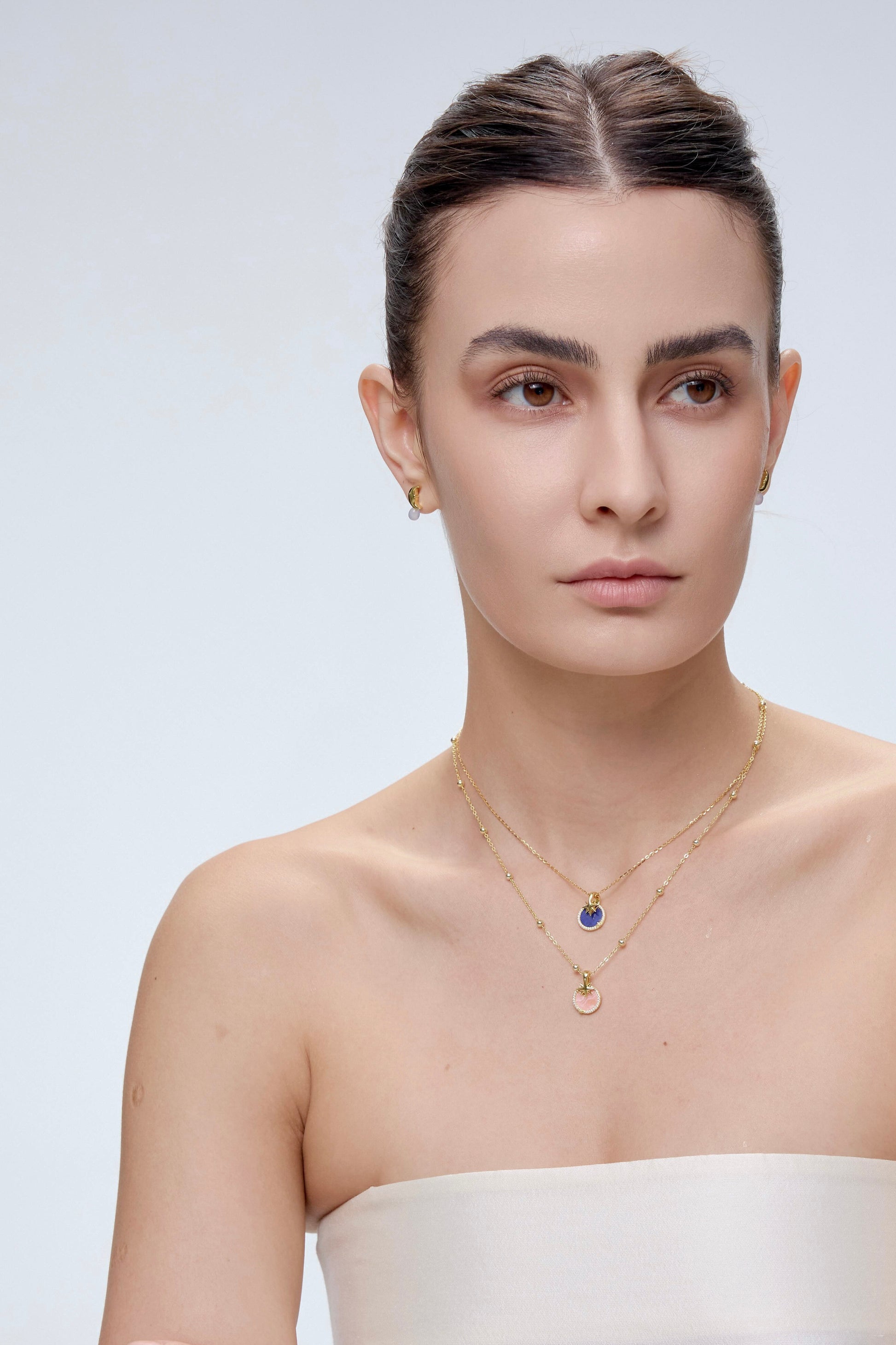 Star Charm styling with crystal disc close-up - FREQNC