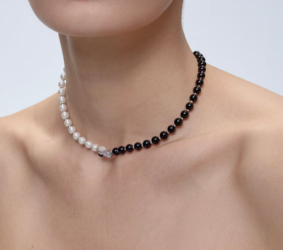 Ouroboros Choker worn on model pearl side - FREQNC