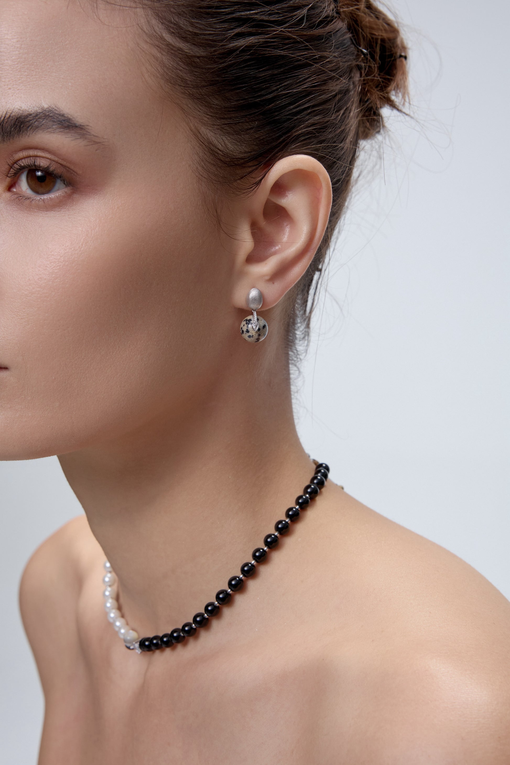 Orphic Egg Earrings worn on model - FREQNC