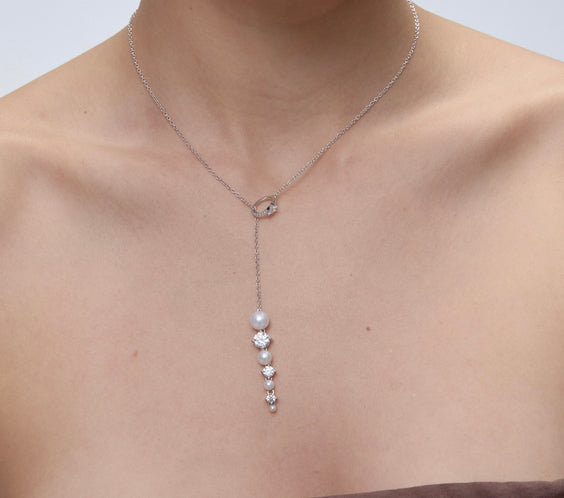 Ouroboros Pearl Drop Necklace worn on model - FREQNC