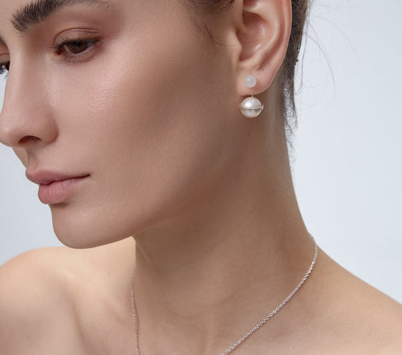 Orphic Cosmic Egg Earrings ear jacket detail on model - FREQNC