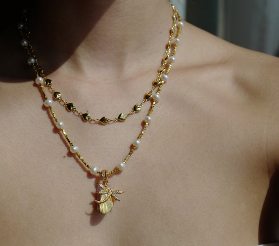 Amor Heart Necklace worn on model collarbone styling - FREQNC