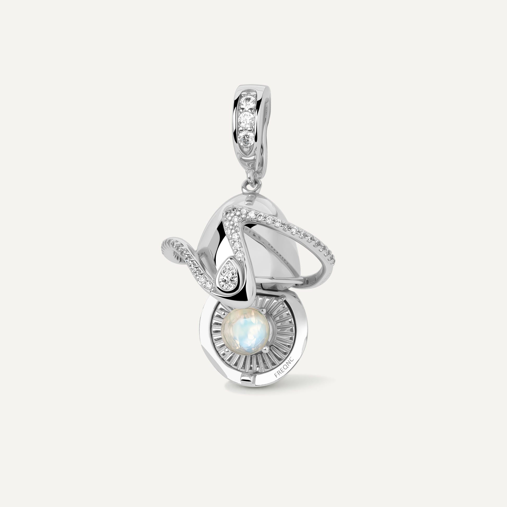 Orphic Egg Charm zodiac crystal talisman pendant closed view - FREQNC atelier