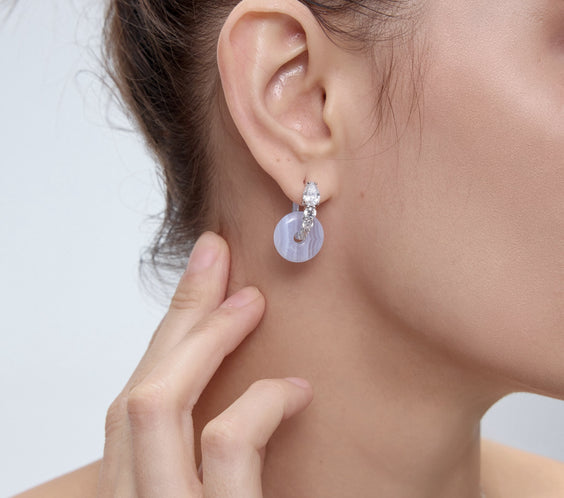 Ouroboros Earrings worn on model - FREQNC