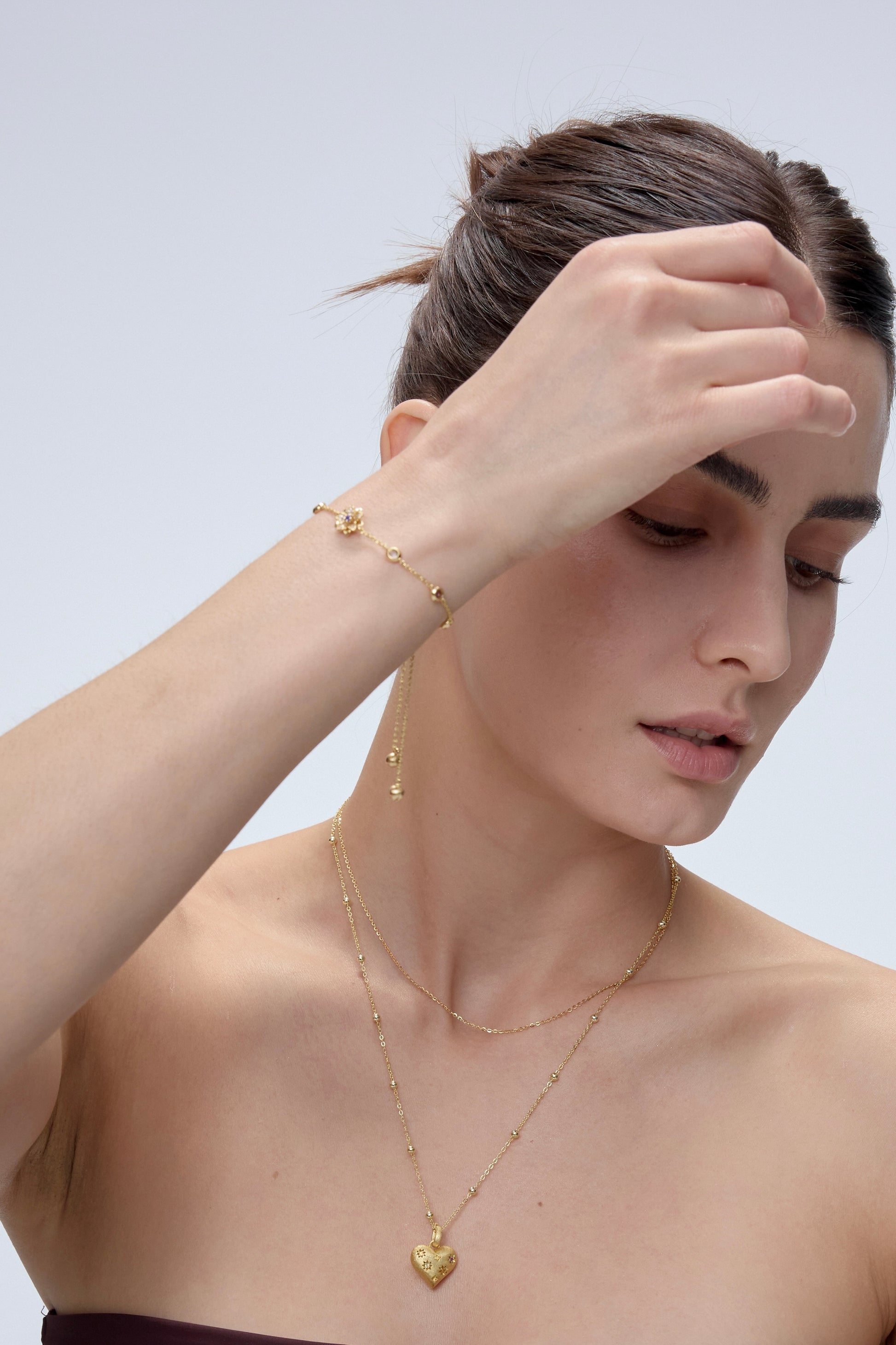 Alchemy of Love Bracelet worn on model wrist - FREQNC atelier