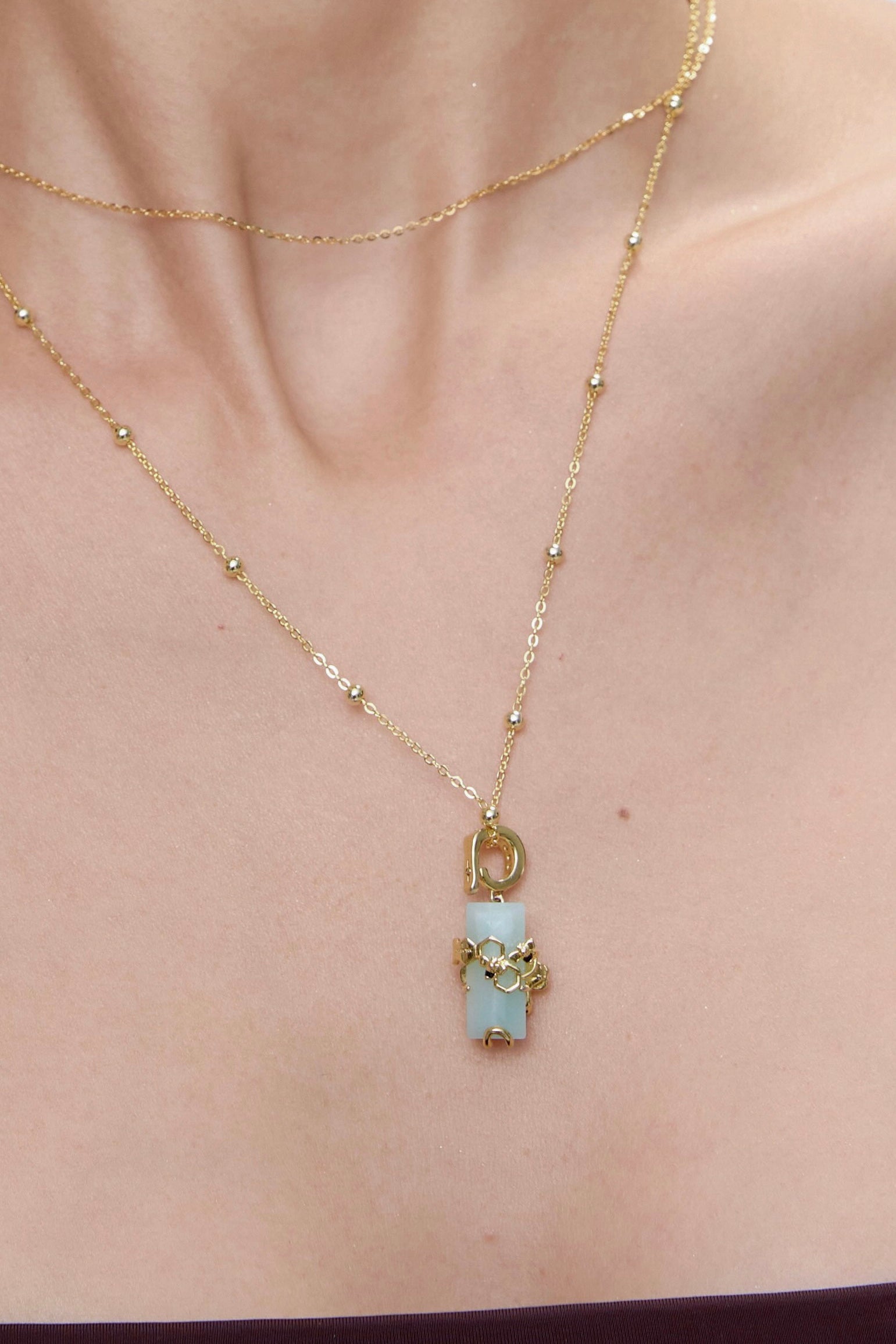HexaMyst Bee Charm worn on model with bracelet styling - FREQNC spirit animal jewelry