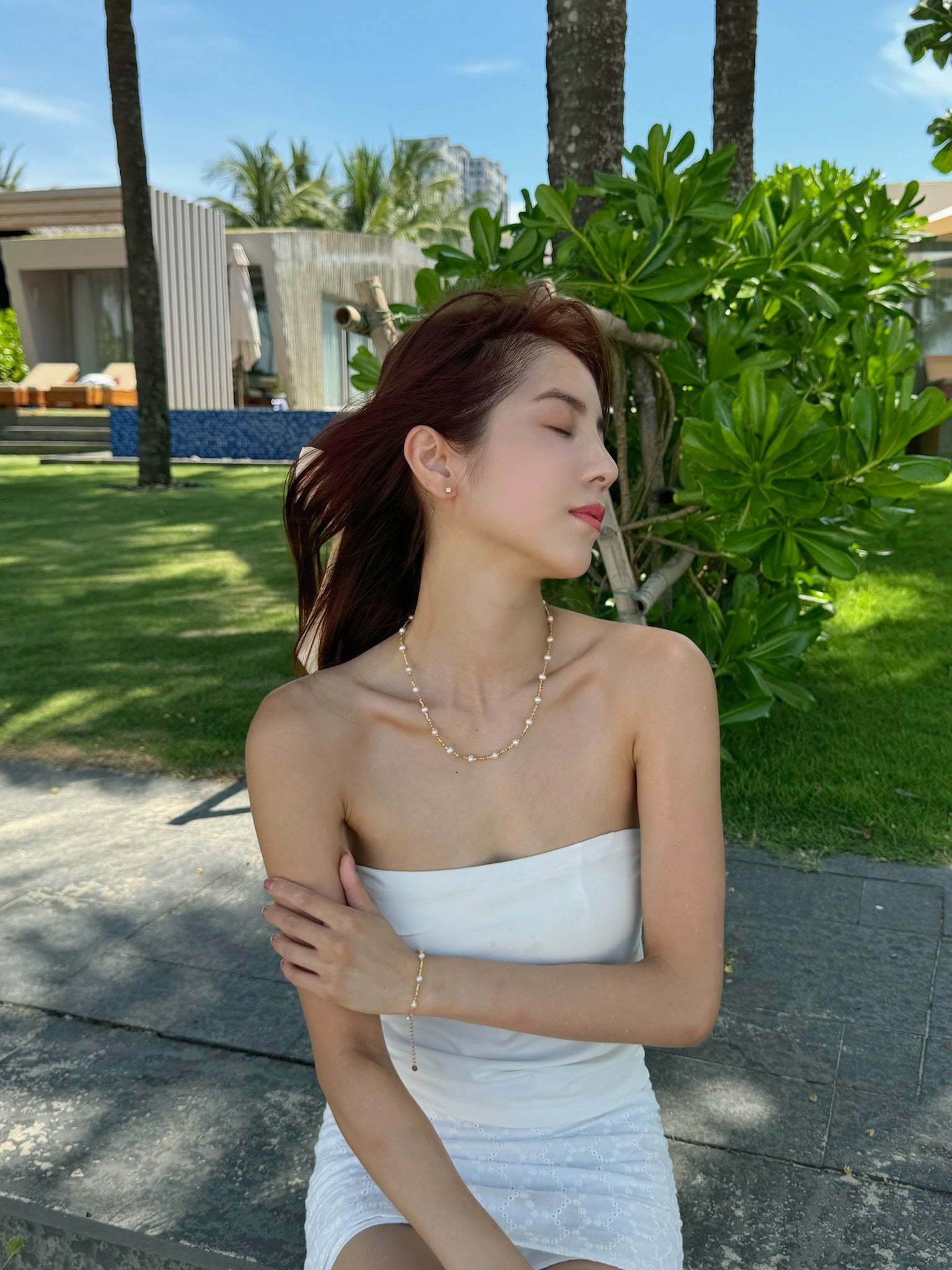 Cassie Natural Pearl Bracelet worn on model wrist - FREQNC