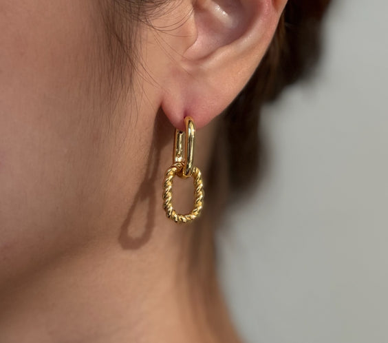 Baddie Convertible Twist Earrings worn on model - FREQNC