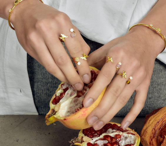 model wearing butterfly ring gold FREQNC atelier