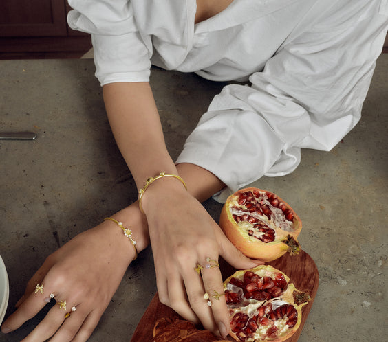model wearing butterfly ring gold for breakfast FREQNC atelier