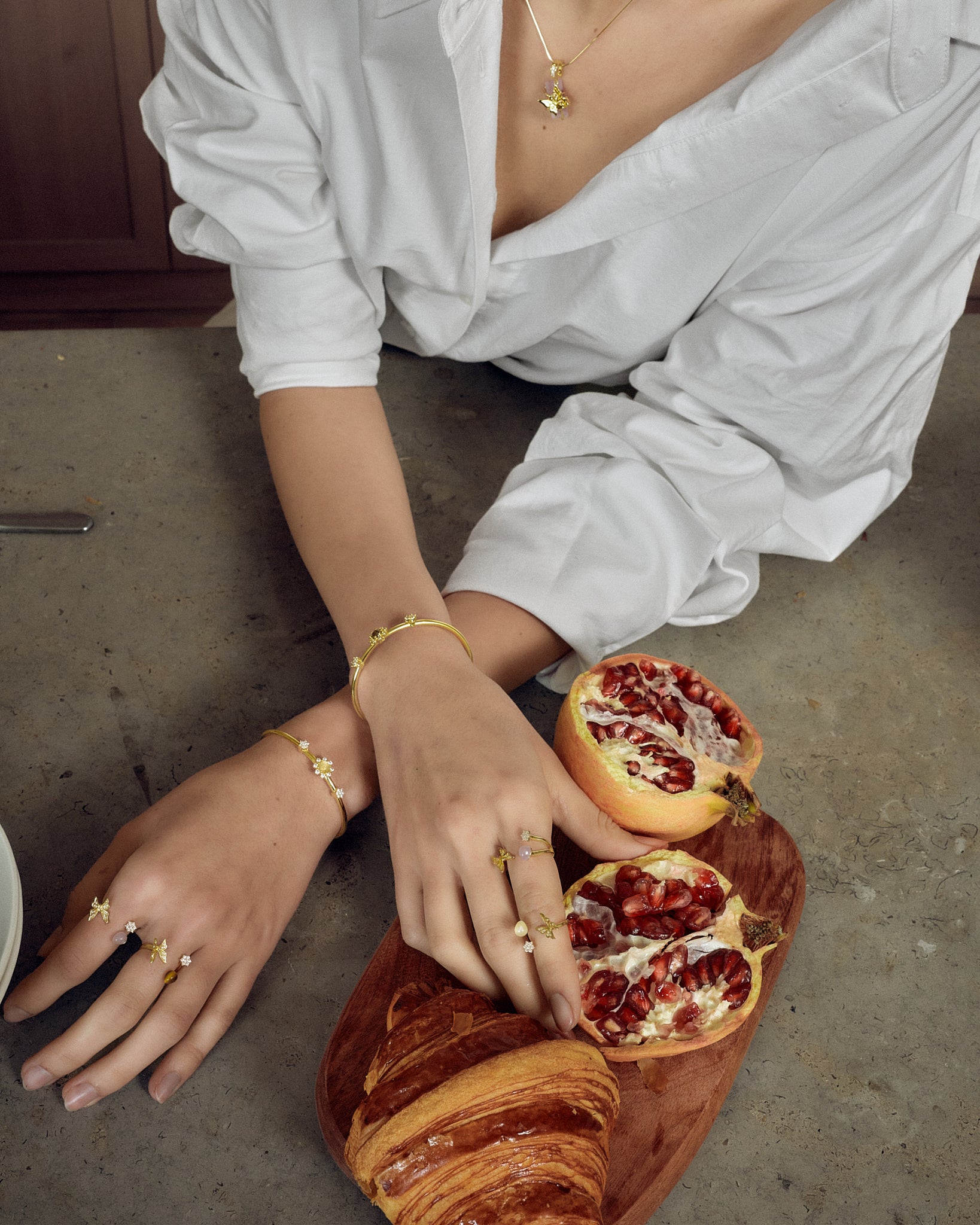 model wearing butterfly ring gold for breakfast FREQNC atelier