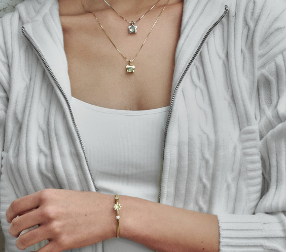 Mini Cuddly Bear Charm worn on model with necklace - FREQNC