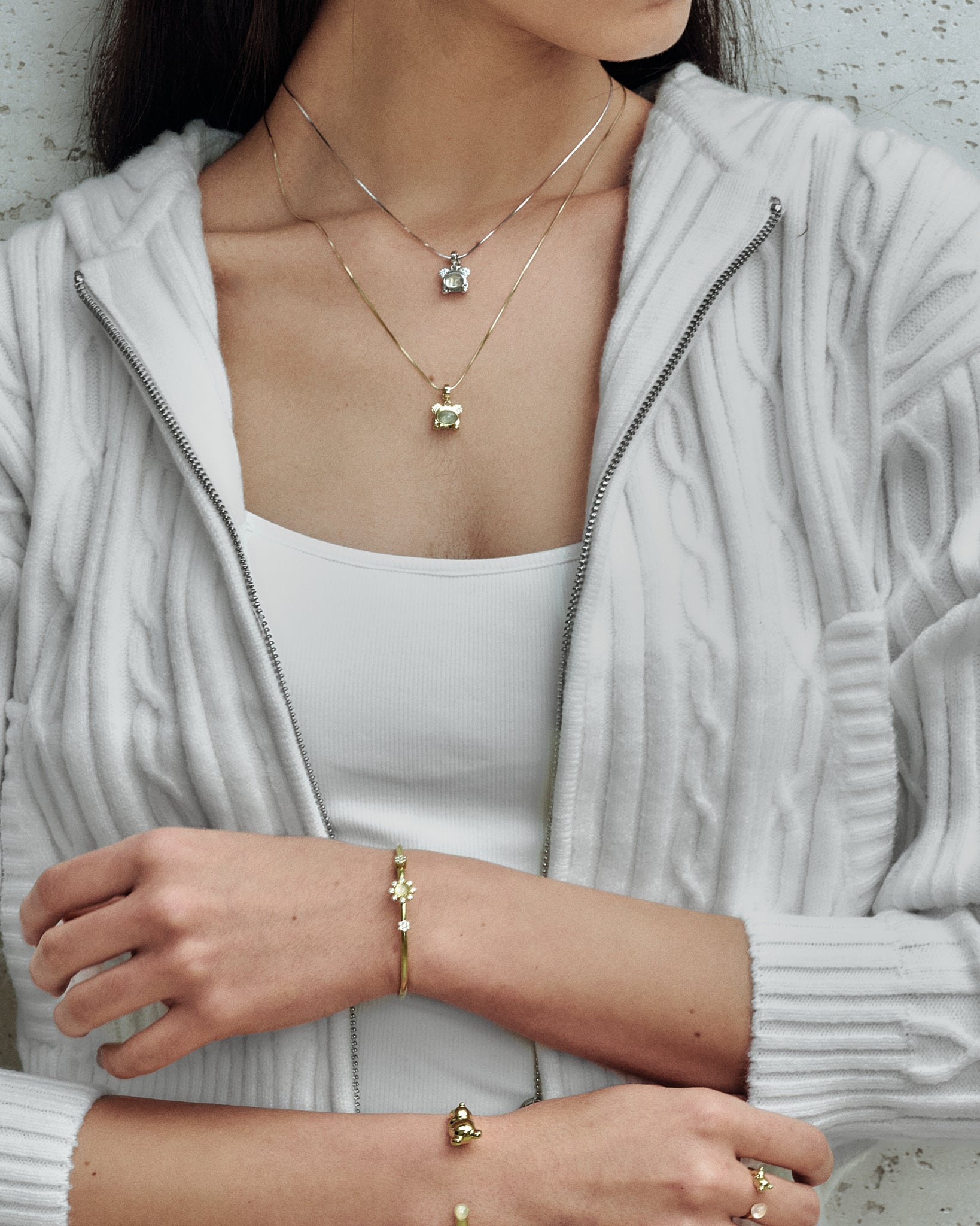 Mini Cuddly Bear Charm worn on model with necklace - FREQNC