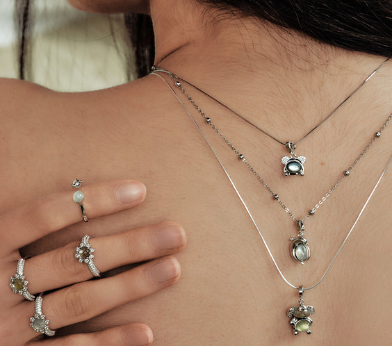 Mini Cuddly Bear Charm pendant on model layered styling - FREQNC