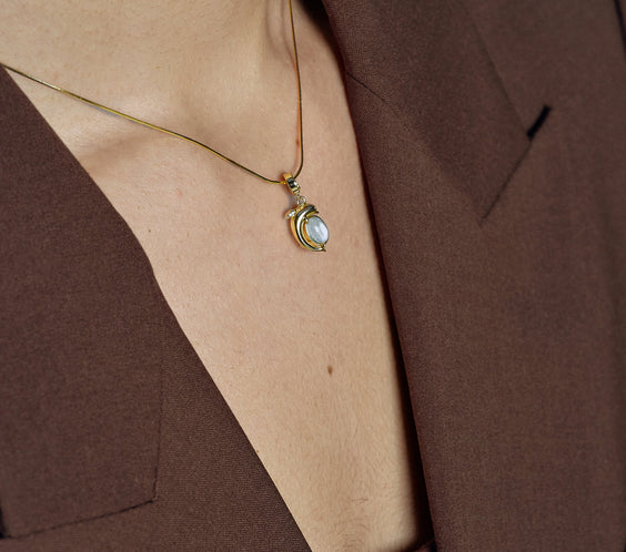 Mini Dolphin Charm pendant on model layered styling - FREQNC