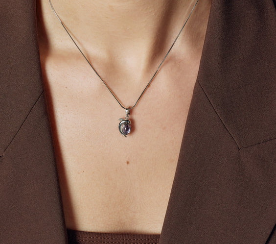 Mini Dolphin Charm styling on model close-up - FREQNC atelier