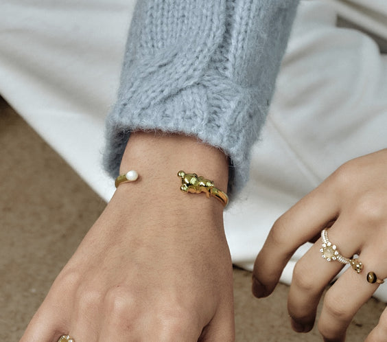 Cuddly Bear Bangle worn on model with stacked styling - FREQNC