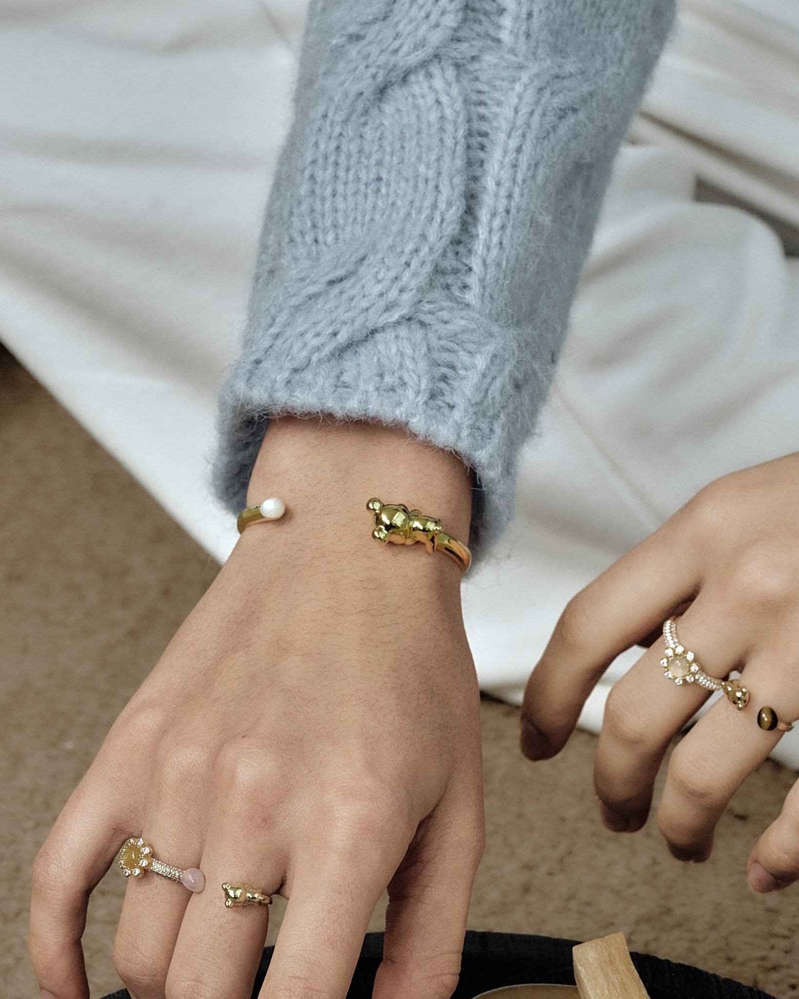 Cuddly Bear Bangle worn on model with stacked styling - FREQNC