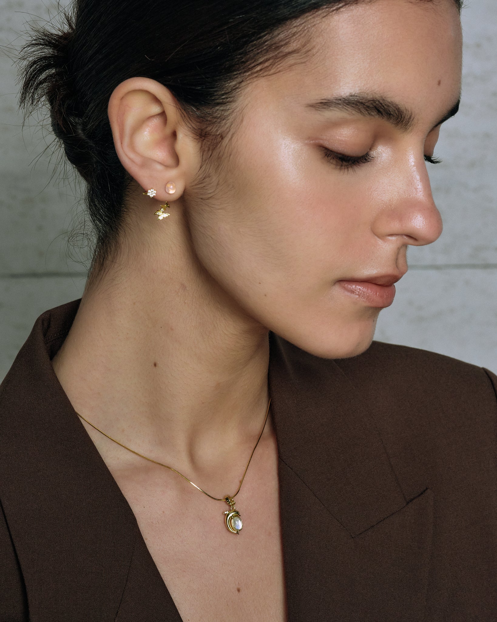 Butterfly Earrings worn on model with layered jewelry - FREQNC