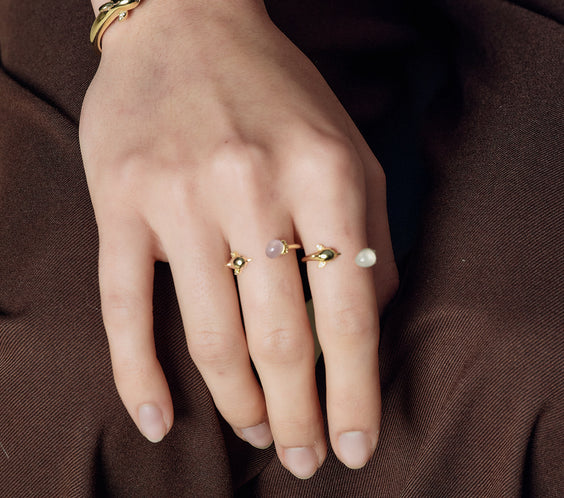 Dolphin Bangle styling on model wrist - FREQNC