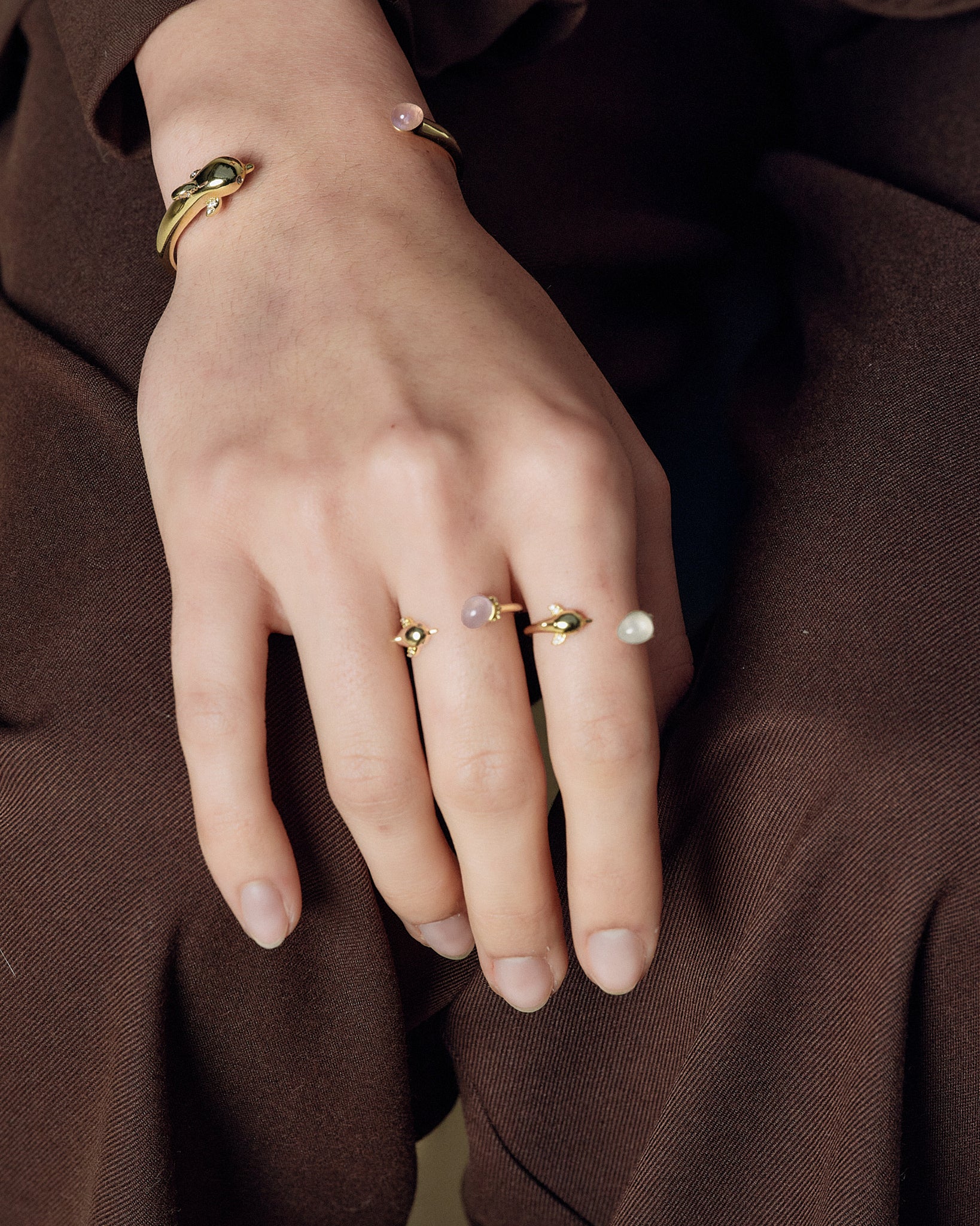Dolphin Bangle styling on model wrist - FREQNC