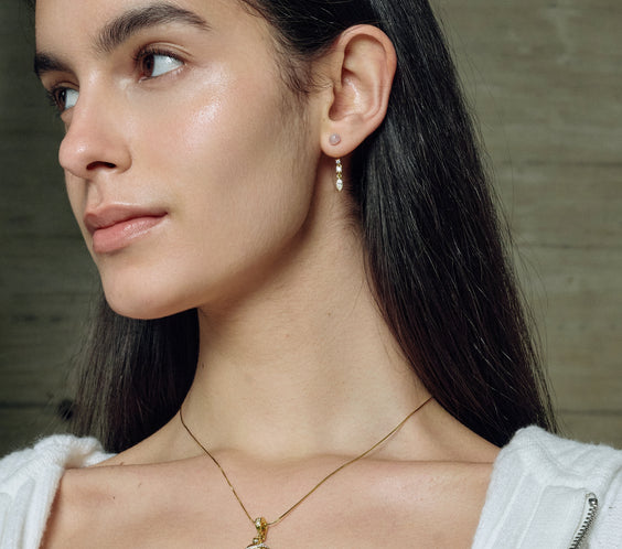 Serpent Earrings worn on model close-up - FREQNC spirit animal